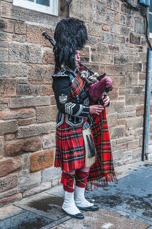 Bagpiper in typical costume. Edinburgh, Scotland