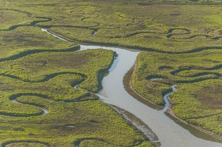 Aerial view of the meandering tidal channels of the Venice lagoon, Italyの写真素材