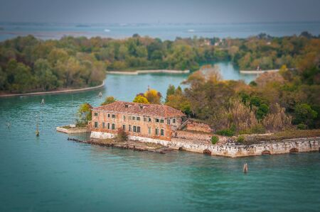 Certosa island with autumn-colored trees tilt shift effectの写真素材