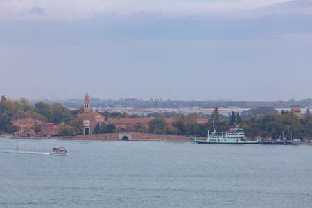 View of the ferry dock on the island of Lido near the church of San Nicoloの写真素材