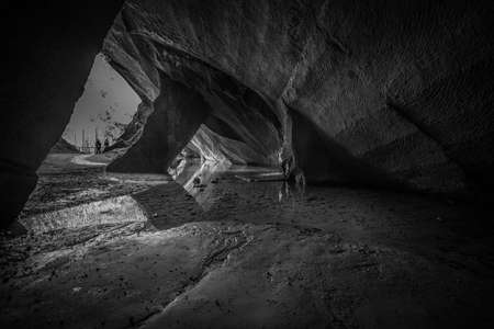 Black and white effect of crystalline water in a vaulted cave