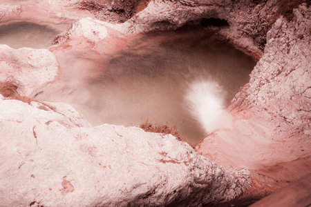 Small waterfalls and pools of transparent and crystalline water in a streamの写真素材