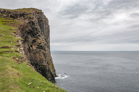 Cliffs overlooking the sea in the Isle of Skye. Concept: travel in Scotland, typical Scottish landscapes, places of charm and mysteryの写真素材