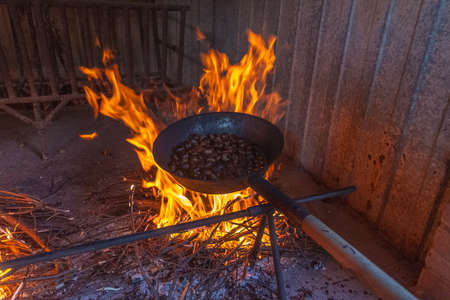 Chestnuts cooked over the fireの写真素材