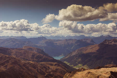 Awesome alpine panorama between Italy and Switzerland with Resia Lake visibleの写真素材