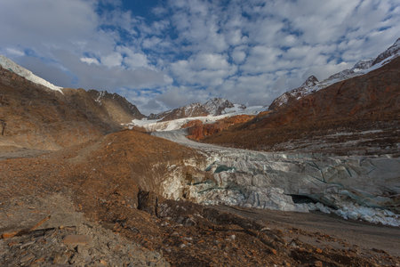 Vallelunga Glacier tongue collapsing front with ice cave, Alto Adige, Italyの写真素材