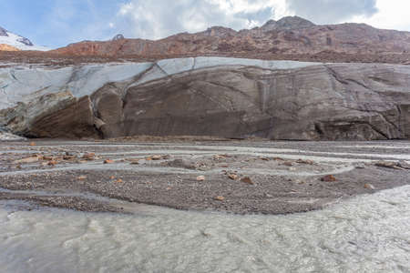 Turbid stream in the middle of Vallelunga Glacier tongue, Alto Adige, Italyの写真素材