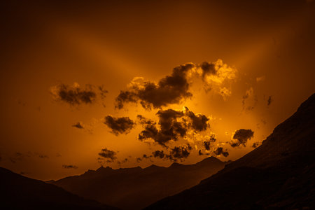 Fantasy color effects in a mountain summer sunsetの写真素材