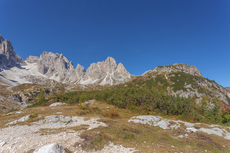 Summer view of rocky ridges of Croda Rossa di Sesto Mountain in Comelico regionの写真素材