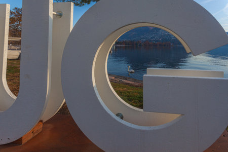 Metal inscription with the name of the city of Luganoのeditorial素材