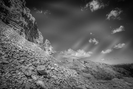 Black and white view of the rocky crests of the Latemar Massif, Dolomites, Italyの写真素材