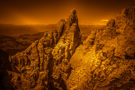 Orange color effect view dolomite rocky scenario in the Latemar Massif, Italyの写真素材