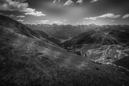 Black and white panorama of the Fiemme Valley surrounded by numerous peaksの写真素材
