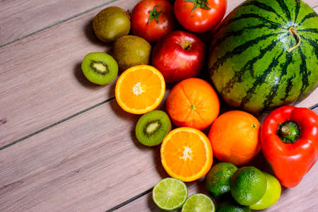 Fresh fruits on wooden boardの写真素材