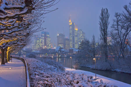 Frankfurt, Snowy night city view by the river Rhein, Germany, Europeのeditorial素材