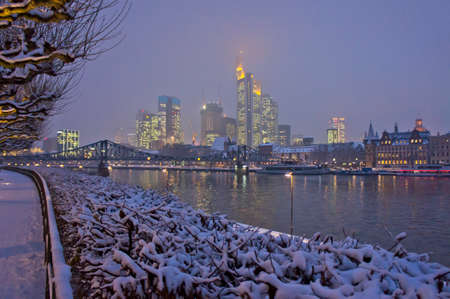 Frankfurt, Snowy night city view by the river Rhein, Germany, Europeのeditorial素材