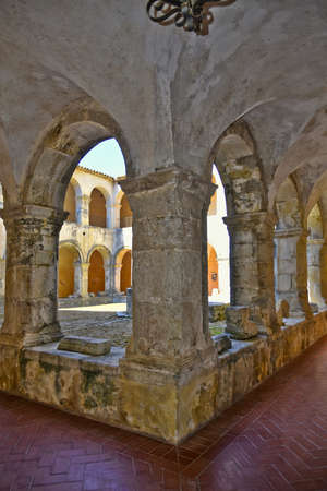 Arches in the inner courtyard of a monastery, now a historical museum, in Altomonte, a rural village in the Calabria region, Italy.のeditorial素材