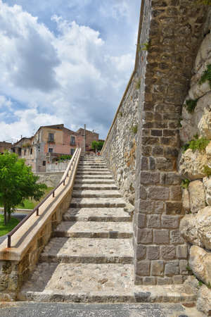 A narrow street among the old houses of Caiazzo, a medieval village in the Campania region, Italy.の写真素材