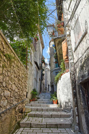 A narrow street among the old houses of Cusano Mutri, a medieval village in the Campania region, Italy.の写真素材