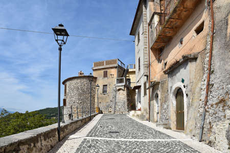 A narrow street among the old houses of Campoli Appennino, a medieval village in the Lazio region, Italy.の写真素材