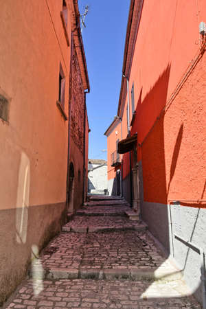 A narrow street among the old houses of Sepino, a medieval town in the Molise region, Italy.の写真素材
