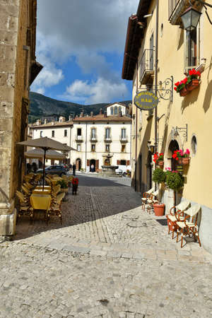 A narrow street among the old houses of Pescocostanzo, a medieval village in the Abruzzo region.
