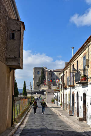 A narrow street among the old houses of Melfi, an old town in the Basilicata region, Italy.のeditorial素材