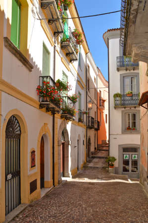 A narrow street with among the old houses of Rivello, a medieval village in the Basilicata region.の写真素材