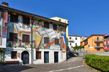 A narrow street among the old houses of Sant'Angelo le Fratte, a medieval village in the Basilicata region.のeditorial素材