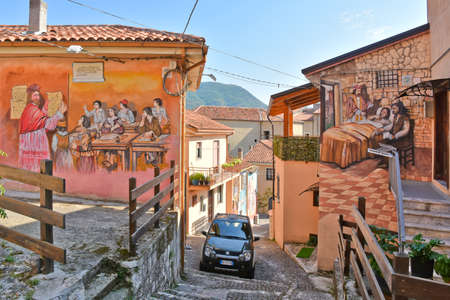 A narrow street among the old houses of Sant'Angelo le Fratte, a medieval village in the Basilicata region.のeditorial素材