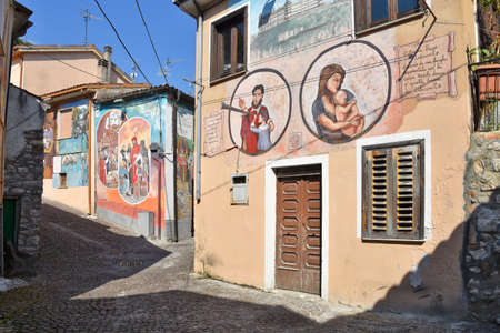 A narrow street among the old houses of Sant'Angelo le Fratte, a medieval village in the Basilicata region.のeditorial素材
