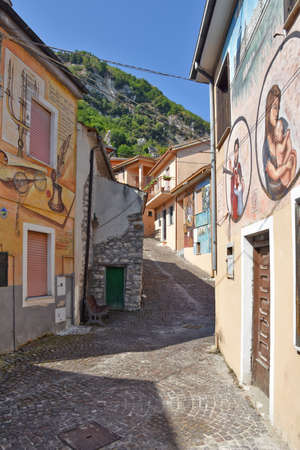 A narrow street among the old houses of Sant'Angelo le Fratte, a medieval village in the Basilicata region.のeditorial素材