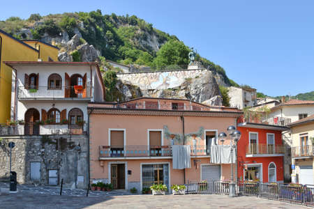 The facade of a house embellished with murals in Sant'Angelo le Fratte, a village in the Basilicata region, Italy.のeditorial素材