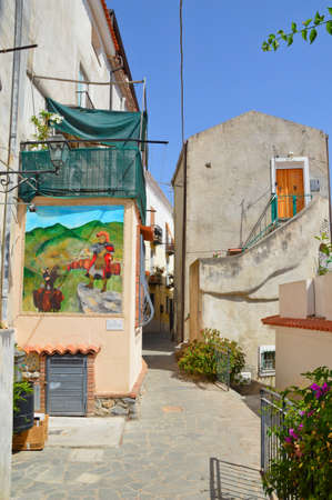 A narrow street among the old houses of San Nicola Arcella, an old town in the Calabria region, Italy.のeditorial素材