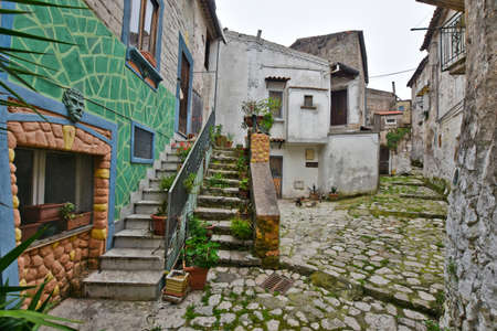 A narrow street among the old houses of Pietramelara, a medieval village in the Campania region.の写真素材