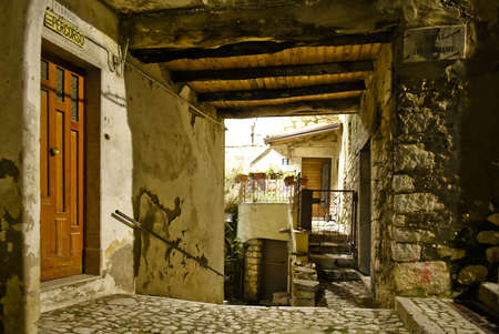 A narrow street between the old houses of Guardia Sanframondi, a medieval village in the province of Salerno, Italy.のeditorial素材