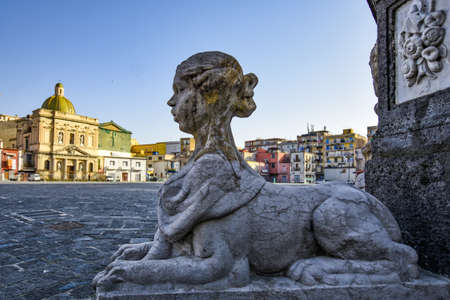Naples, Italy, February 28, 2021. The head of an ornamental statue of a fountain in the market square of the city.のeditorial素材