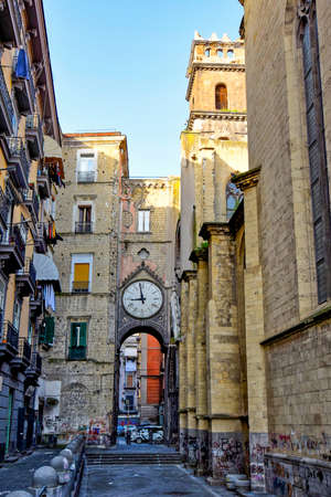 Naples, Italy, February 28, 2021. The tower with clock of the Saint Eligius church in the historic...