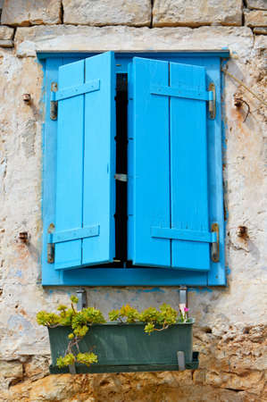 Solta, Croatia, 08/28/2017. The window of a typical house on an island in Croatia.