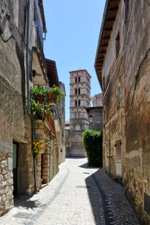 Sermoneta, Italy, 05/10/2021. A street between old medieval stone buildings in the historic town.のeditorial素材