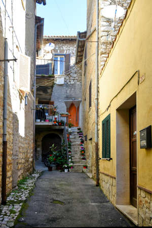 Sezze, Italy, 05/10/2021. An alley between the old houses of a medieval town in the Lazio region.のeditorial素材