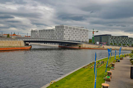 Berlin, Germany, July 26, 2015. Modern buildings on the river running through the German capital.のeditorial素材