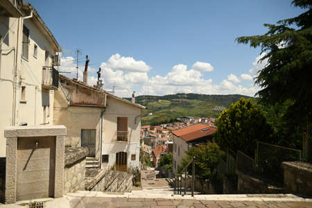 Ruvo del Monte, Italy, 06/12/2021. A small street between the old houses of a medieval village in the Basilicata region.のeditorial素材