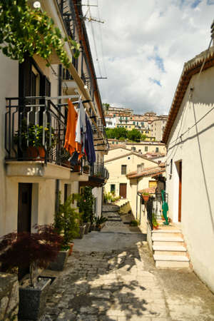 Muro Lucano, Italy, June 12, 2021. A narrow street among the old houses of a medieval village in the Basilicata region.のeditorial素材