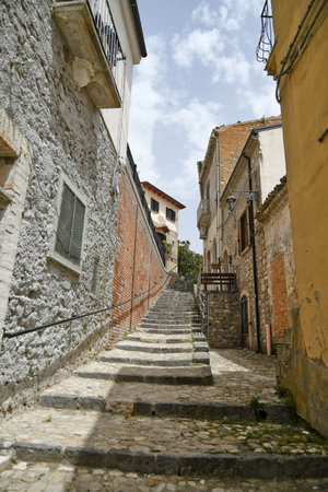 Deliceto, Italy, June 23, 2021. A small street between the old houses of a medieval village in the mountains of the Puglia region.の写真素材