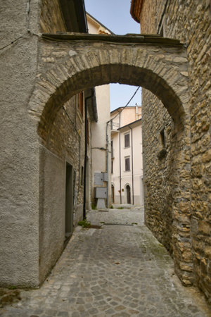 Agnone, Italy, 06/21/2021. A small street between the old houses of a medieval village del Molise region.のeditorial素材