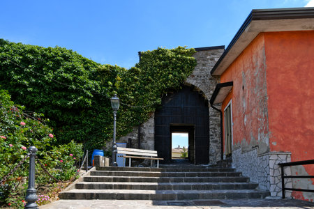 Vallata, Italy, July 3, 2021. An entrance door into the old town of a village in the Campania region of Italy.のeditorial素材