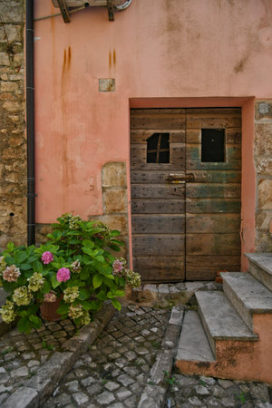 The facade of an old house in Maenza, a medieval town in the Lazio region, Italy.のeditorial素材