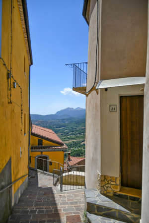 A narrow street among the old houses of Castelluccio Superiore, a small town in the province of Potenza in the Basilicata region, Italy.の写真素材