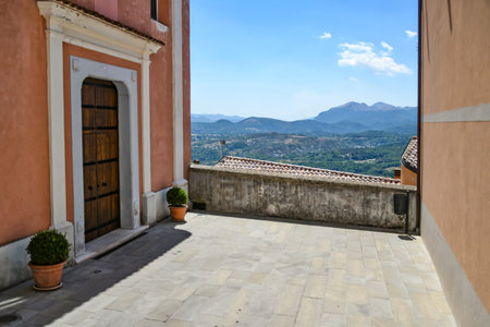 The entrance door to a small church in Castelluccio Superiore, a small town in the mountains of the province of Potenza in Basilicata region.の写真素材